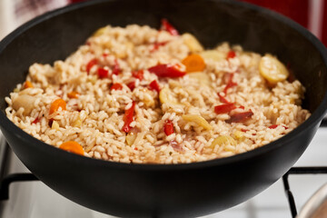 Risotto with vegetables in the pan