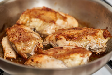 Seared chicken breasts in the pan