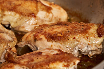 Seared chicken breasts in the pan