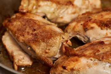 Seared chicken breasts in the pan
