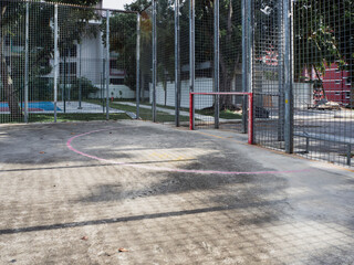 Caged futsal court in a residential neighbourhood