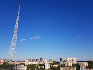 Cell tower against the blue sky