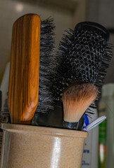 Hairbrush and powder brush in the bathroom 