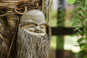 wood carved figure buddha face, travel