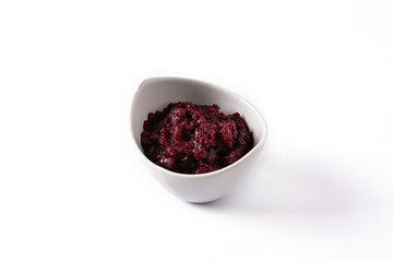 Beetroot sauce in white bowl isolated on white background