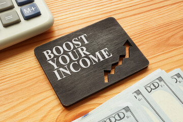 Plate with words boost your income and calculator.
