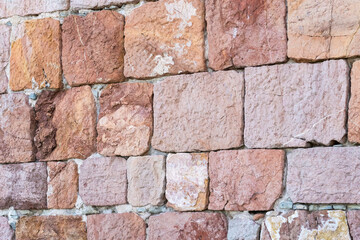 Old stone wall with natural stones