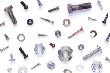 Set of old metal screw, bolt head, nut, washer and nail tool isolated at white background