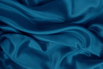Dark blue fabric cloth texture for background and design art work, beautiful crumpled pattern of silk or linen.