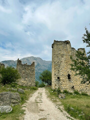 Road to ancient ruined city in a mountain valley, Ingushetia, Caucasus, Russia