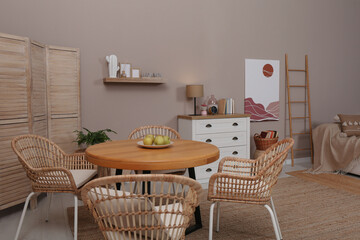 Fototapeta na wymiar Modern living room with stylish wooden furniture. Interior design
