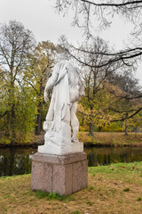 Fototapeta premium Russia, Saint-Petesburg, October 2020: Antique sculptures of man in the Central Park of Culture and Recreation on Yelagin Island in St. Petersburg