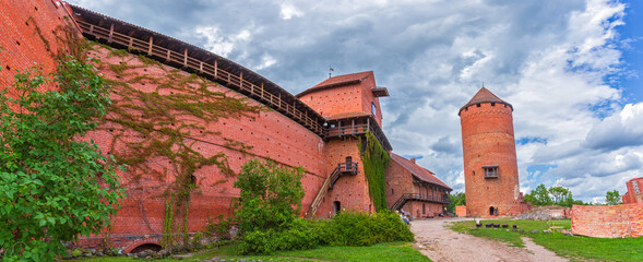Panorama of Old Turaida castle with tower in a sunny day. Summer landscape. Gauja national park,...