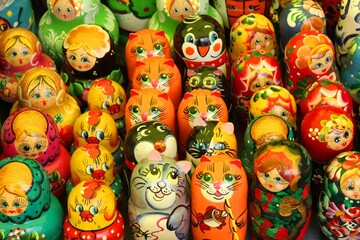 Fototapeta na wymiar Very beautiful Novgorod nesting dolls from Russia with the faces of seals, birds, people.