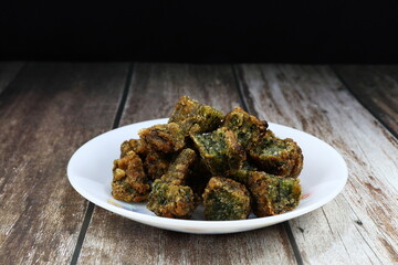 Deep fried chives dumpling serving on the plate. Famous traditional dim sum menu in Asia...
