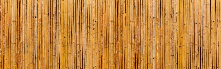 Panorama of Brown old Bamboo fence texture and background seamless