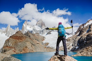 Advanture traveler enjoy the view of Fitz Roy Mountain, Patagonia, Argentina. Mountaineering sport lifestyle concept - obrazy, fototapety, plakaty