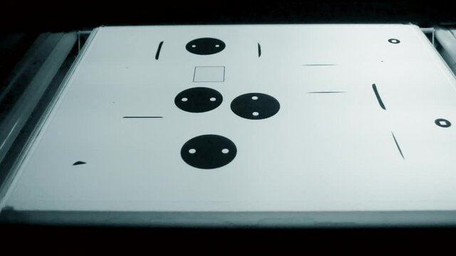 Industrial powder 3D printer printing process close-up.