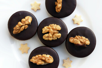 Delicious Ischler cookies with walnuts, small romantic stars around. Homemade baking, Christmas time