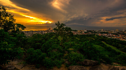 Natural background, wide angle of sky and clear air, overlooking mountains, green trees surrounding it, with cool blurry winds throughout the journey.
