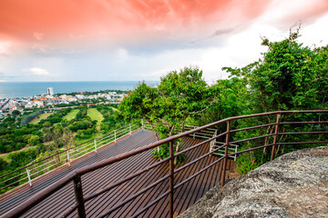 Natural background, wide angle of sky and clear air, overlooking mountains, green trees surrounding it, with cool blurry winds throughout the journey.