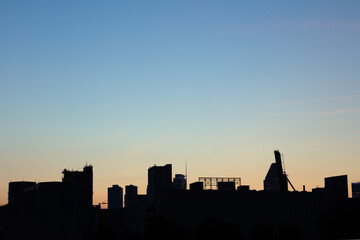 urban skyline cityscape sunset orange sky downtown skyscrapers silhouette