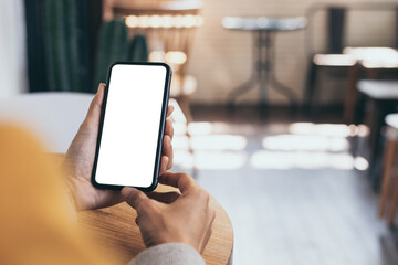 cell phone blank white screen mockup.woman hand holding texting using mobile on desk at office.background empty space for advertise.work people contact marketing business,technology
