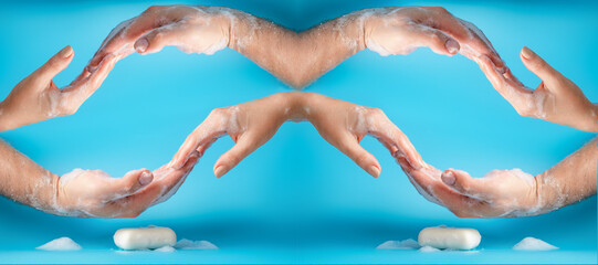 Global Handwashing Day, personal hygiene concept. Male and female hand in soapy blue background.