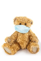 Teddy bear wearing surgical mask