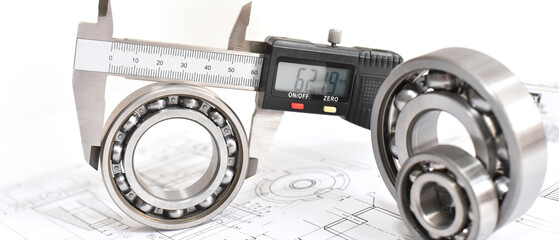 Quality control in modern mechanical engineering - caliper gauges, technical drawing and ball...
