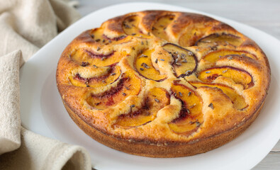 Peach pie. Homemade baking. Selective focus. Close up. Top view.