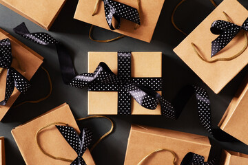 Black friday concept with craft package with black bow and ribbon