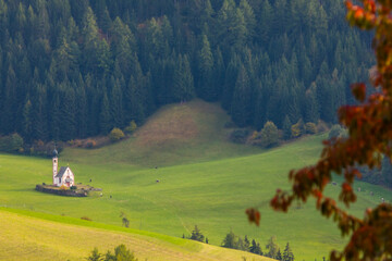 Sunset and rainbow in Val Di Funes, Dolomites, Alps, Italy