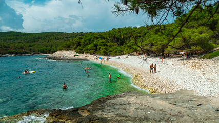 Vis Croatia, July 2021 Srebrna beach on the island of vis, directly translated meaning Silver Beach. Summer of 2021, tourists traveling during covid times to warm croatia - obrazy, fototapety, plakaty