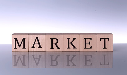 MARKET concept, wooden word block on the grey background