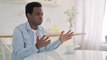 African Man feeling Worried at Home