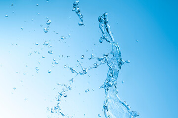 splashing water on a blue background