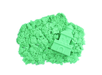 Castle made of kinetic sand on white background, top view