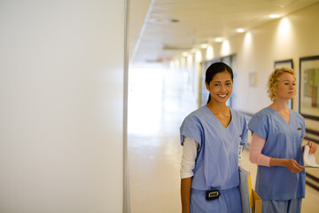 Fototapeta premium Nurses in hospital corridor