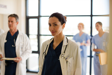 Portrait of smiling doctor in hospital