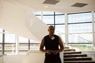 Patient on hospital staircase