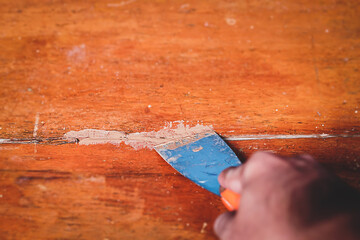 repair wooden floor, wood filler.	