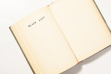 Old open book with blank pages on the white background