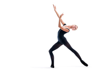 young ballerina in black pointe shoes and leotards posing in graceful pose, isolated on white background