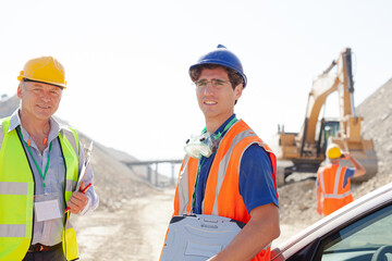 Business people talking in quarry