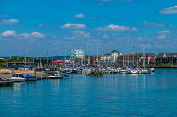Fototapeta na wymiar A view up the River Arun towards the town of Littlehampton in early summer