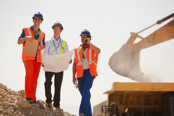 Workers walking in quarry