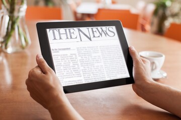 Reading News on Tablet