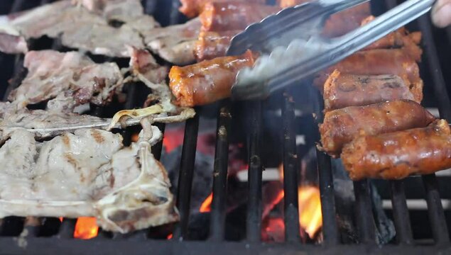 Grilled meat, Mexican food, longaniza, nopales. September 16