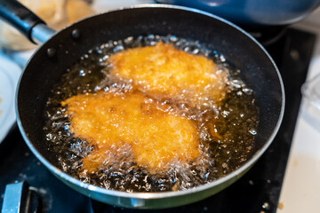 Close up view of katsu being fried